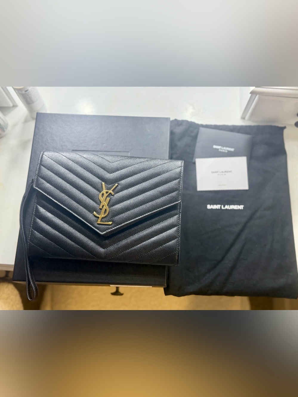 Authentic Saint Laurent Monogram Cassandre Quilted Leather Clutch Black Gold